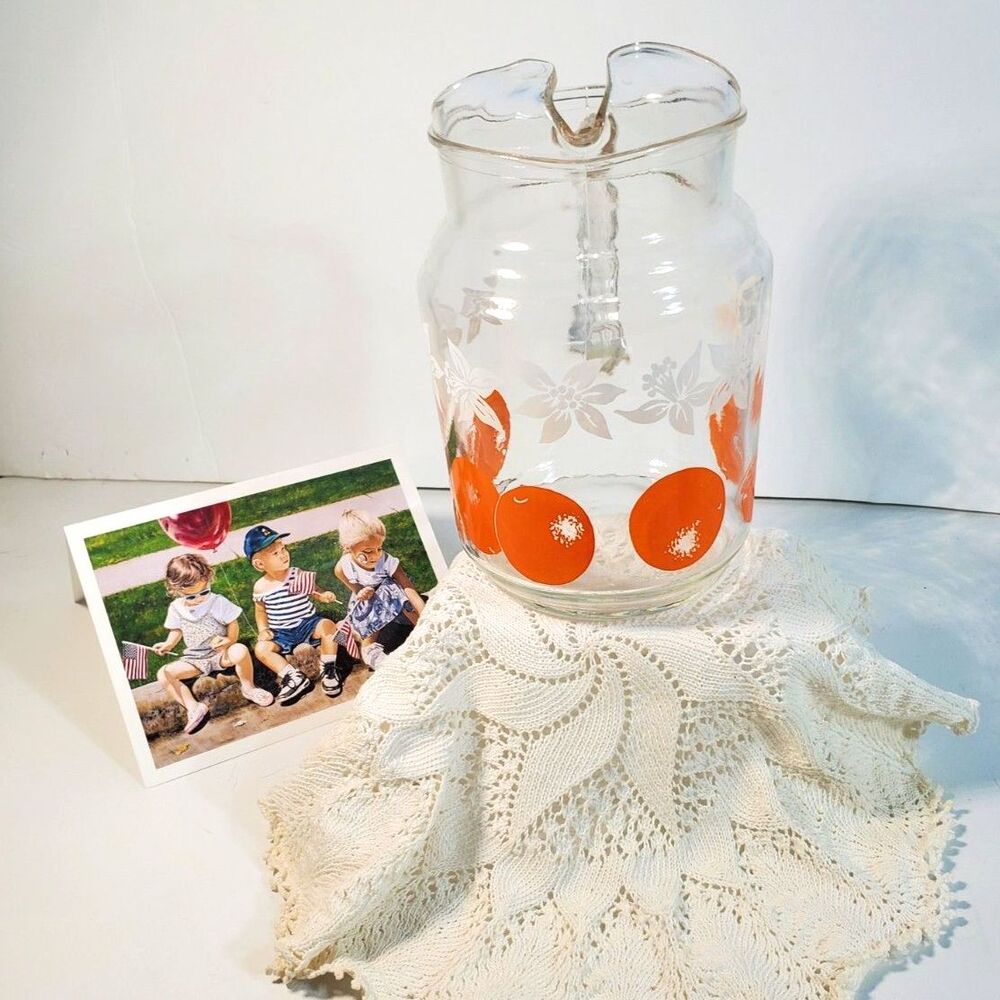 Depression Glass Juice Pitcher with Oranges and White Blooms Born in 1957